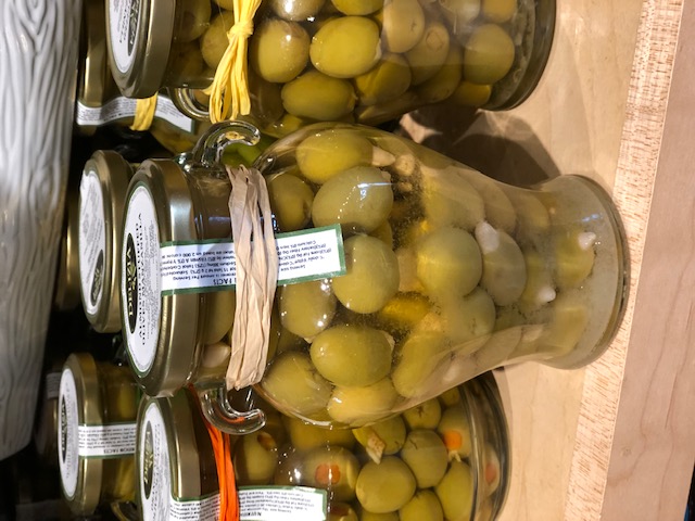 https://alabama-travel.s3.amazonaws.com/partners-uploads/photo/image/5ff1f0f66ba4090008598d8d/Happy Olive olives.jpg
